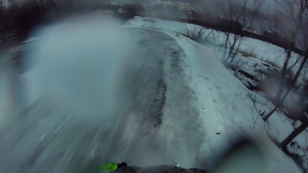 Down an icy slope on a folding bike