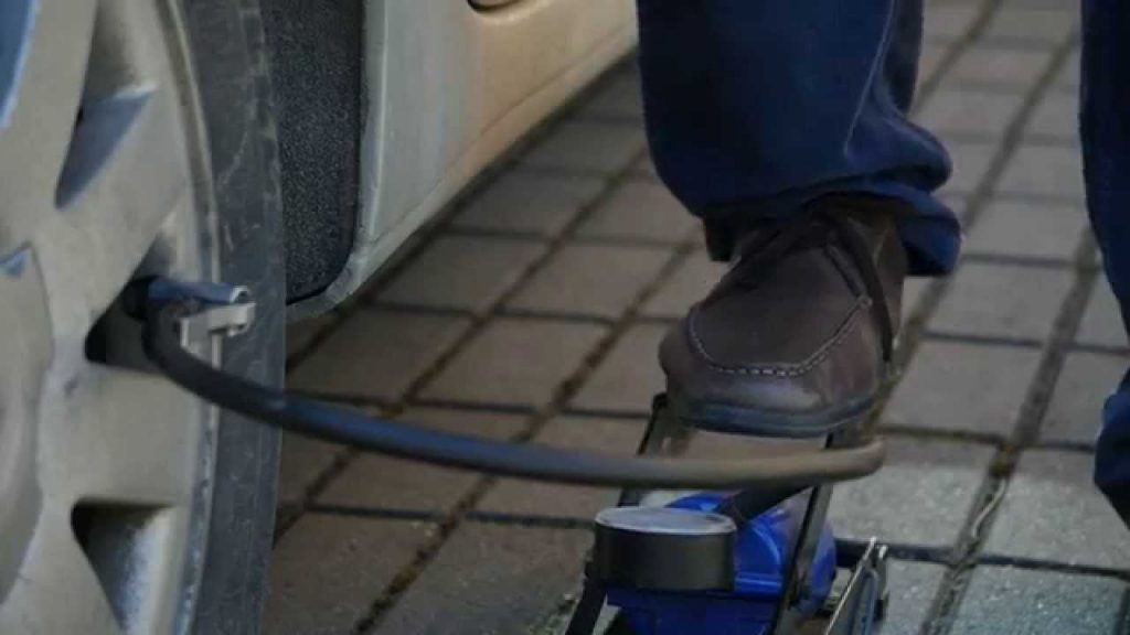 Folding car air pump, foot-inflatable tube tire pump. Free HD video footage