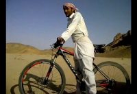 Mountain bike versus camel - Hilarious Bedouin on a bike! Mountain bike versus camel - Hilarious Bedouin on a bike!