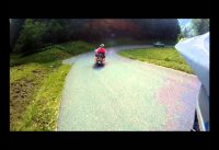 Overtaking a Harley Davidson on a Downhill Mountain Bike Overtaking a Harley Davidson on a Downhill Mountain Bike
