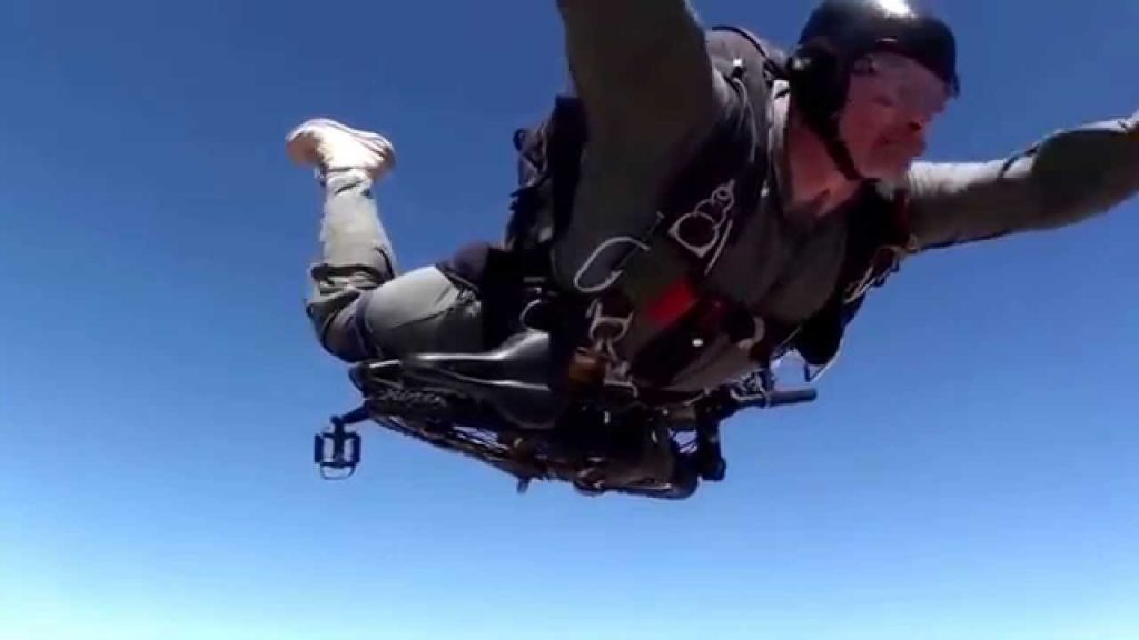 paratrooper jump with a folding bike