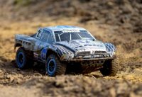 Traxxas Slash 2WD Jumping high at a BMX Track