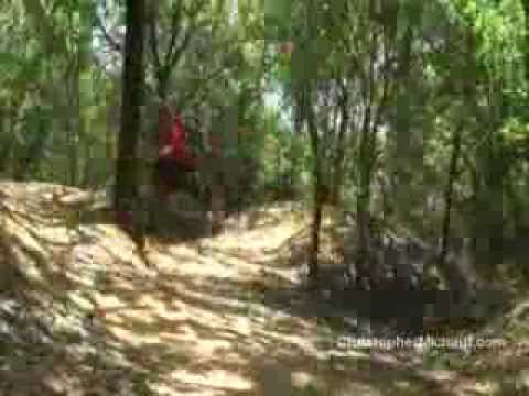 Christopher Michaut riding a mountain bike at Leon Creek in San Antonio