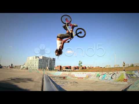 Pond5 Stock Footage - Bmx Bicycle Back Flip Slow Motion In Graffiti Covered Skateboard Park